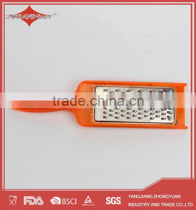 red stainless steel julienne vegetable peeler