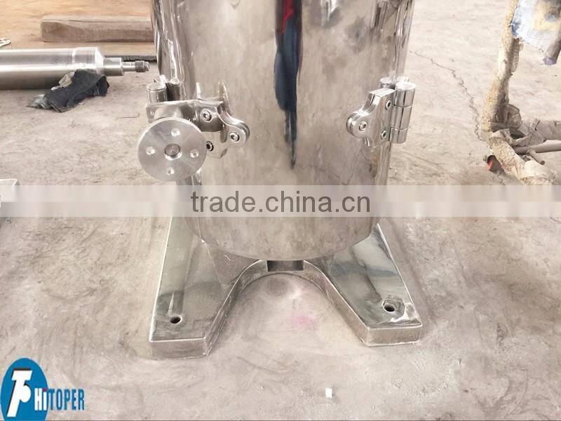 Tubular bowl centrifuge used for oil water separation in coconut oil mill