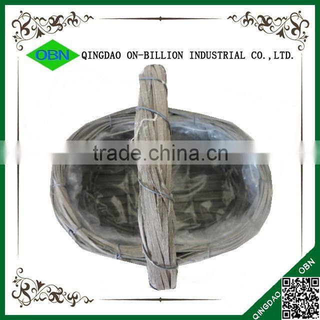 Woven rattan flower basket with handle