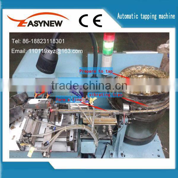 Automatic nut tapping equipment