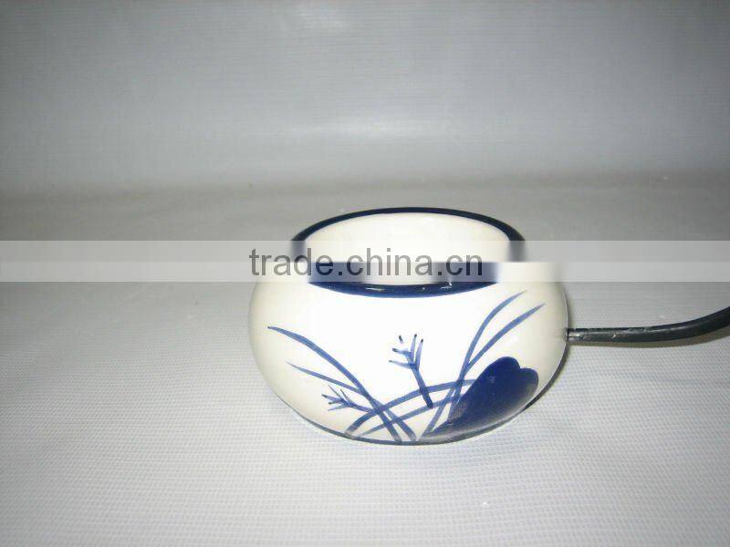 electrical aroma/oil burner with heating plate