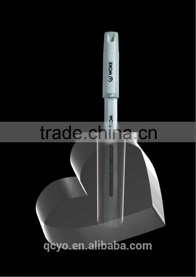 heart shaped office pen holder stand in table