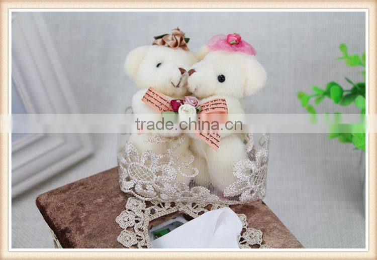Wall mounted tissue box holder