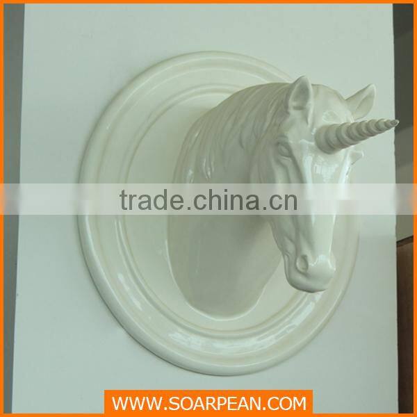 golden fiberglass horse head sculpture