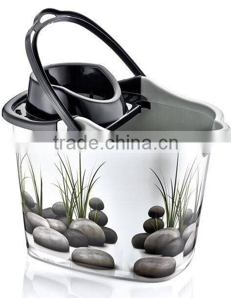 Plastic cleaning bucket very good design with plastic handle with its squeezer and 4 wheels under