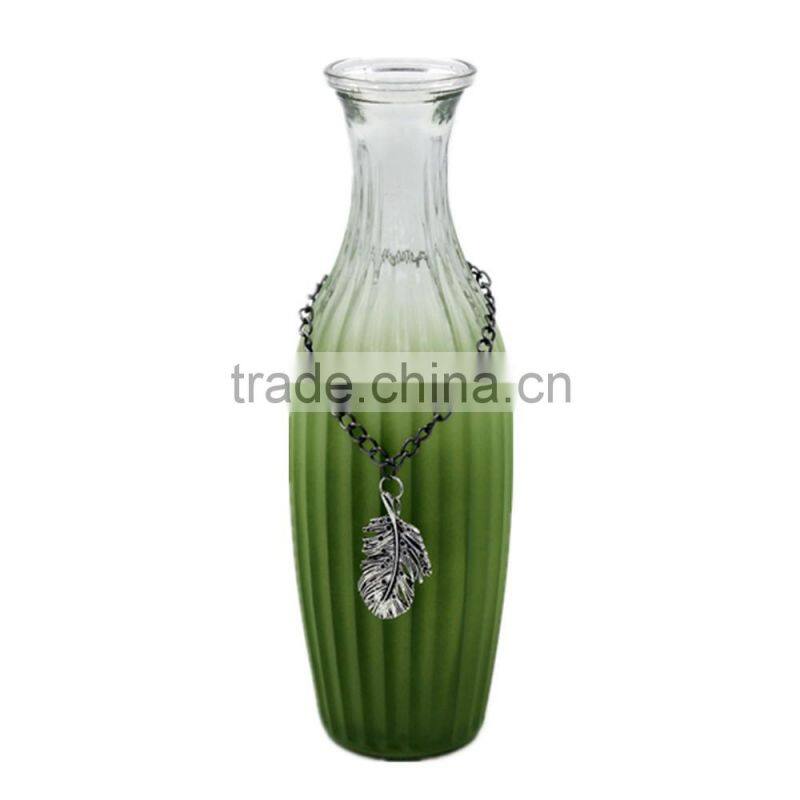 thin green glass vase