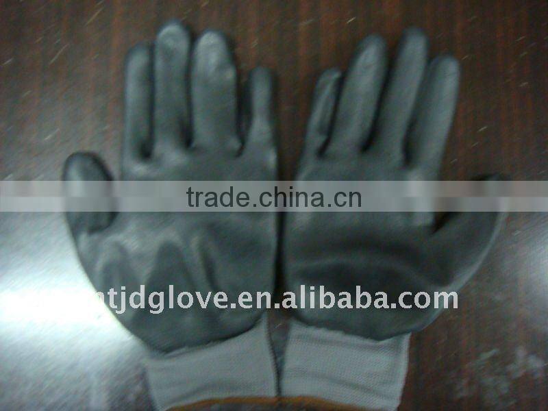 Welding gloves . 13G black Nylon with palm coated black foam nitrile gloves , Knit wrist . working safety gloves