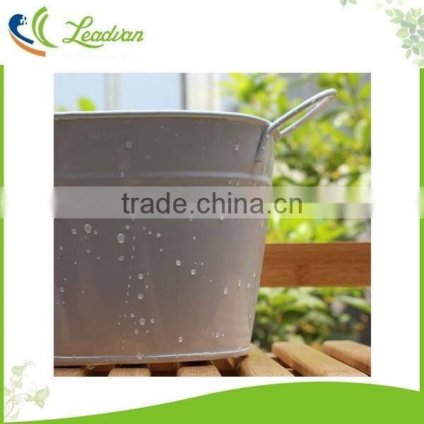 Green bowl shaped embossed metal garden flower pots and planters