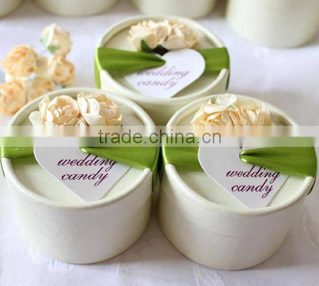 Customized handmade ivory wedding candy box with ribbon and flower
