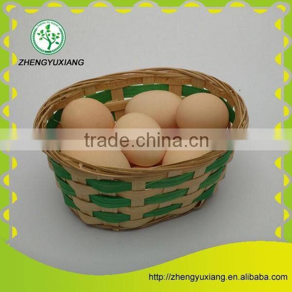 Green bamboo chip woven storage basket