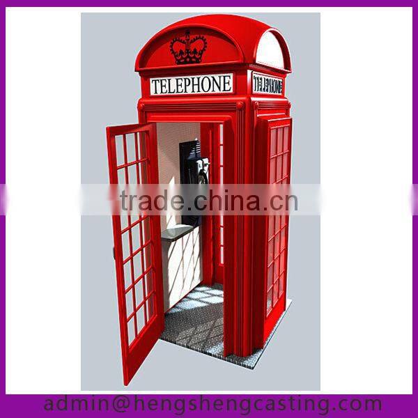 Red kiosk with telephone for UK client, telephone kiosk