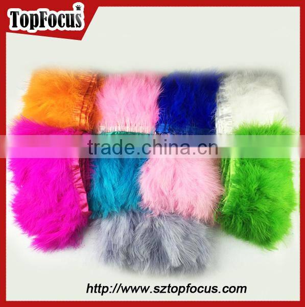 costume designing or dress with trimming blue ribbon turkey marabou feather