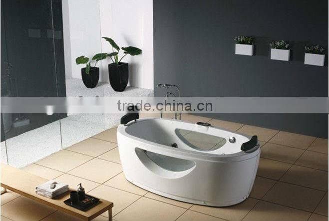 small bathtub with glass