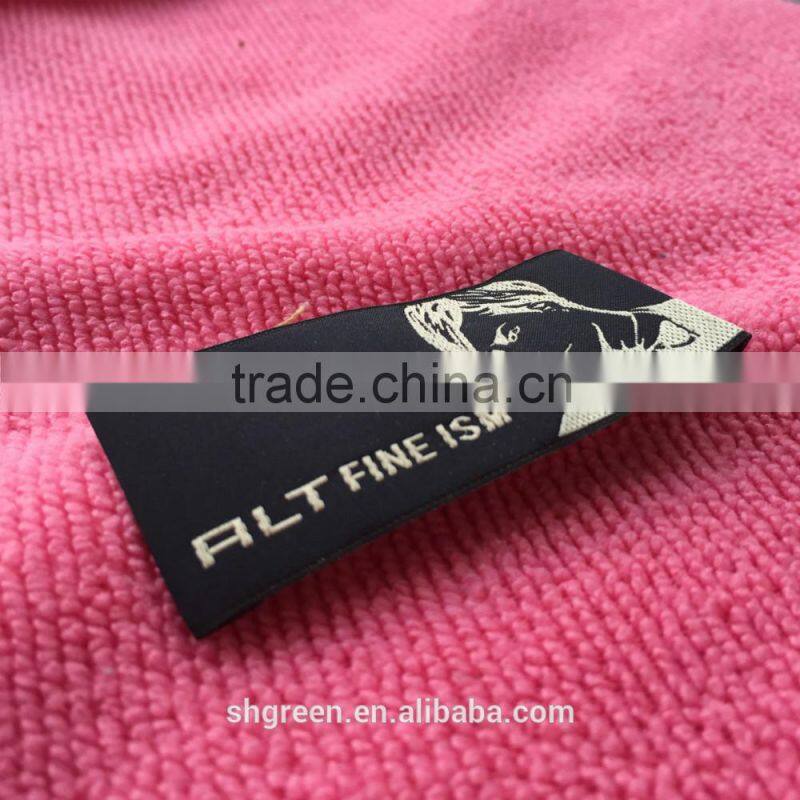 laser cut logo main woven label in apparel
