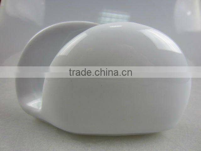 White porcelain fork and spoon holder