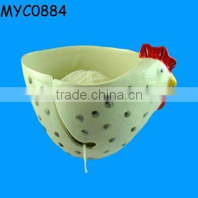 Ceramic pink bowl as yarn closet organizer