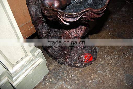 Bronze lady statue with shell water fountain