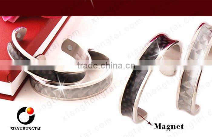stainless steel bangle with magnets ,we have stocks .
