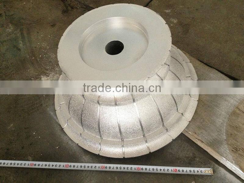 Vacuum brazed diamond cutting and grinding tools for large granite/large diamond granite router bits