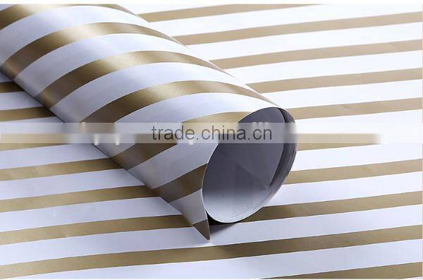Ivory plastic gift wrapping paper roll