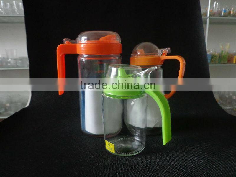 clear glass oil bottle
