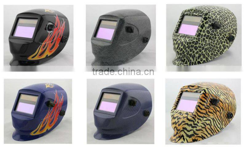 Auto-darkening welding helmet