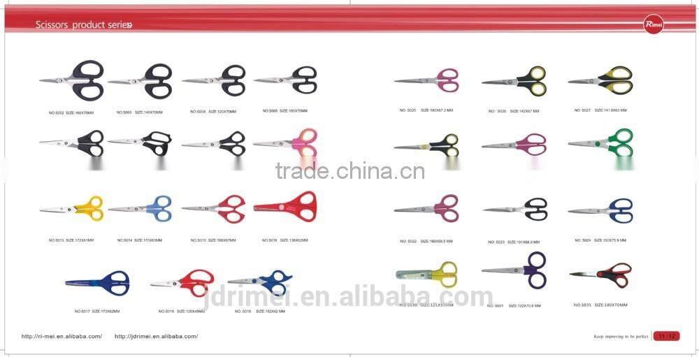 red hand tool engraved scissors