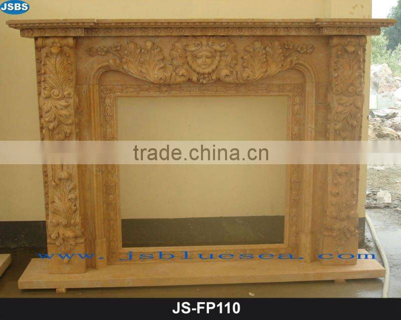 Stone carving of yellow marble fireplace mantel