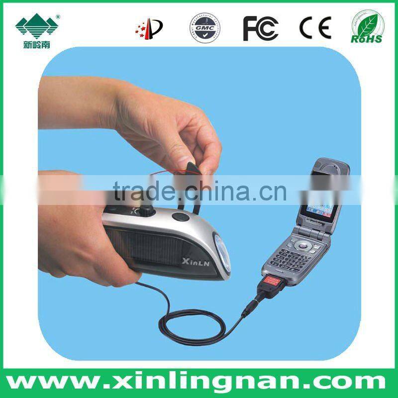 Winding charge solar flashlight radio