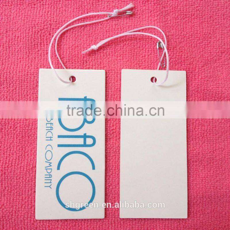 Reflective spot UV paper swing tag for men's wear