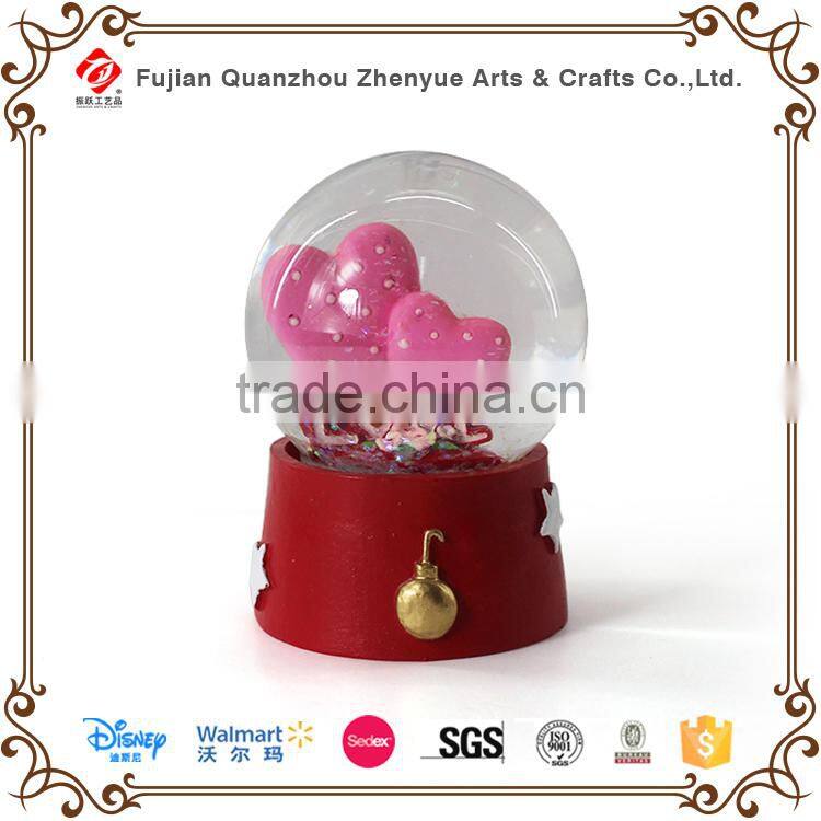 2015 cheap funny plastic snow globe