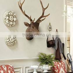 Furry toy looking up lifelike fake animal gorilla