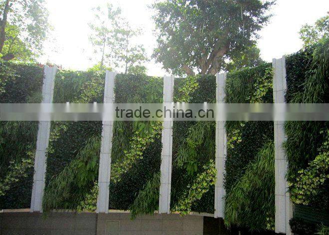 artificial plant wall with leaves/flowers/grass