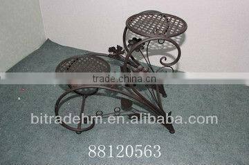 Antique white metal butterfly plant holder