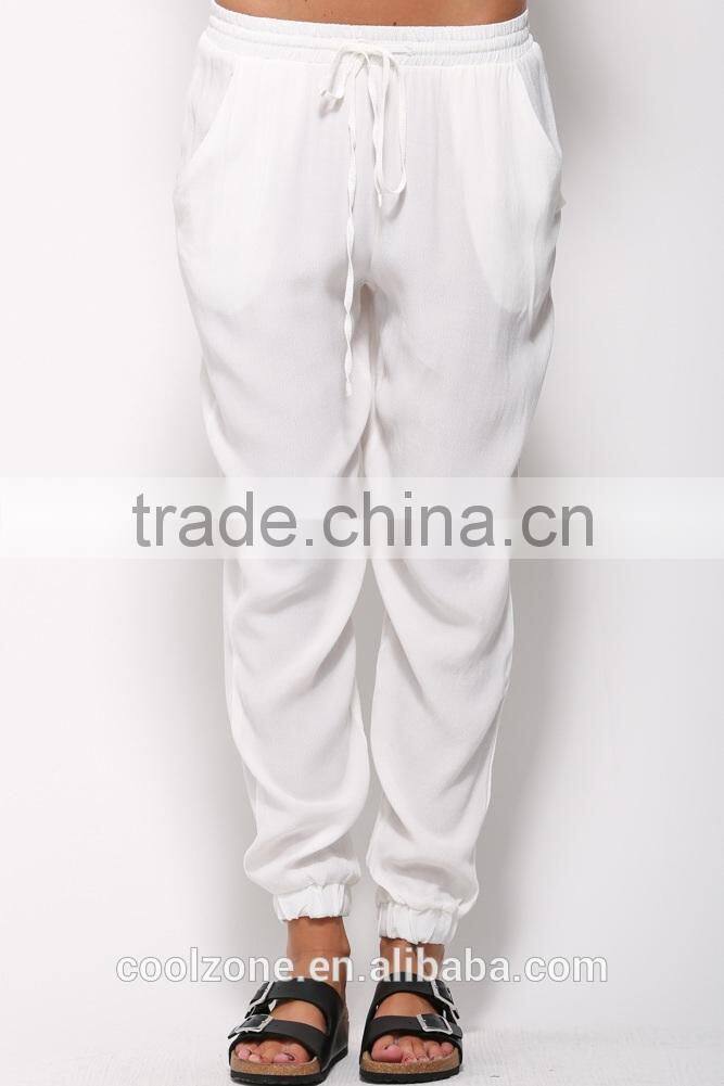 Loose fit elastic tied waist jogger pants with side pockets