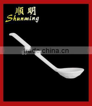 White plastic spoon for soup