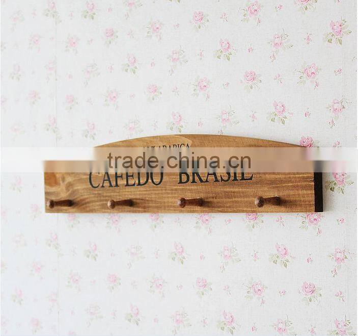 brown zakka wooden wall hanging