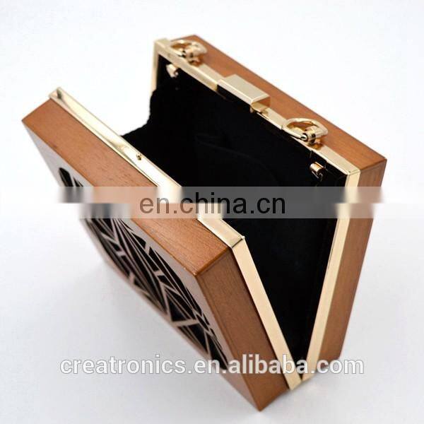 CR Factory OEM acceptable engraving patterns hollowed-out design metal frame long chain rectangled shaped wooden box clutch bag