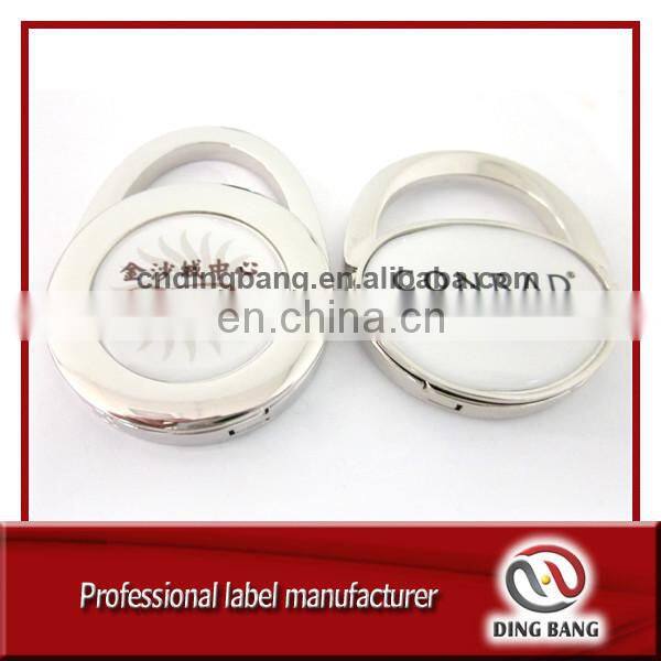 OEM Wholesale Stock Items Various Design Client's Printed /Casted Logo Accepted Fashional Souvenir Custom Bag Hanger