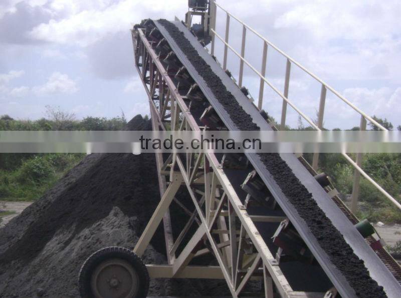 High efficiency brush belt cleaner for conveyor