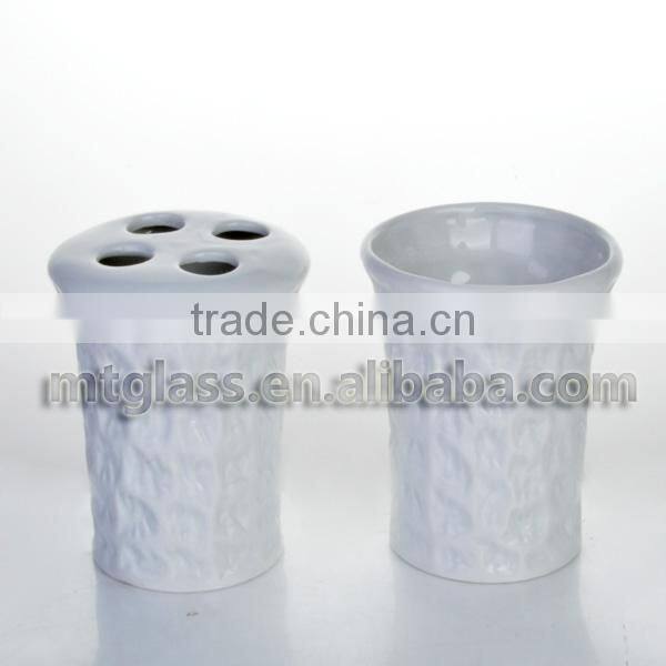 White porcelain ceramic toothbrush and toothpaste holder with cover
