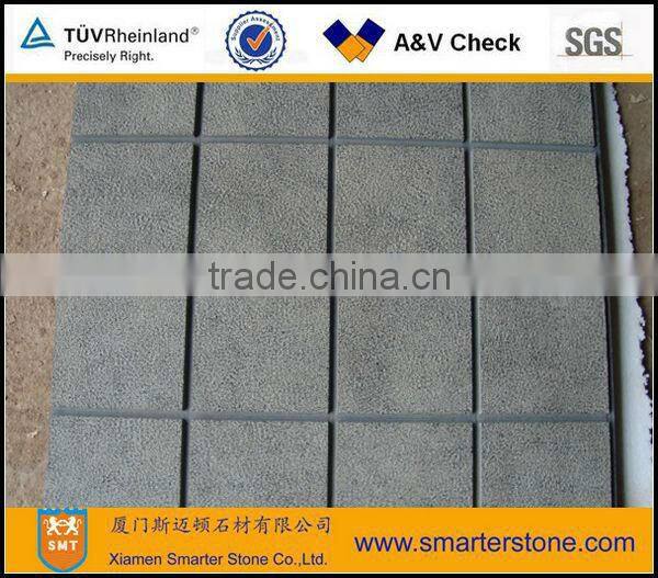 Bush hammered paving stone basalt with honeycombs