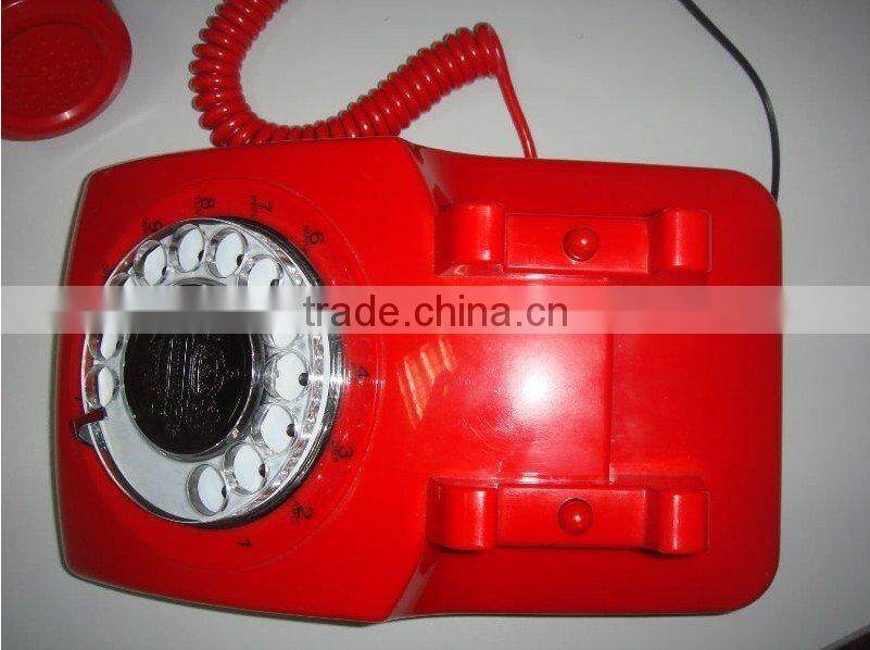 antique telephone with rotary dialing key
