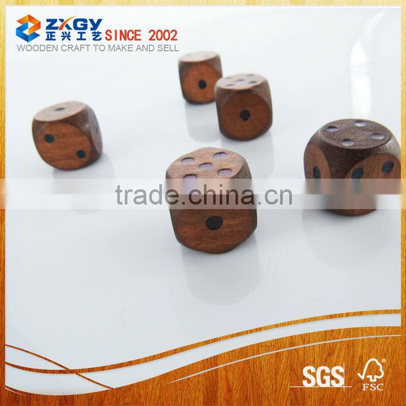 wooden pieces and dice