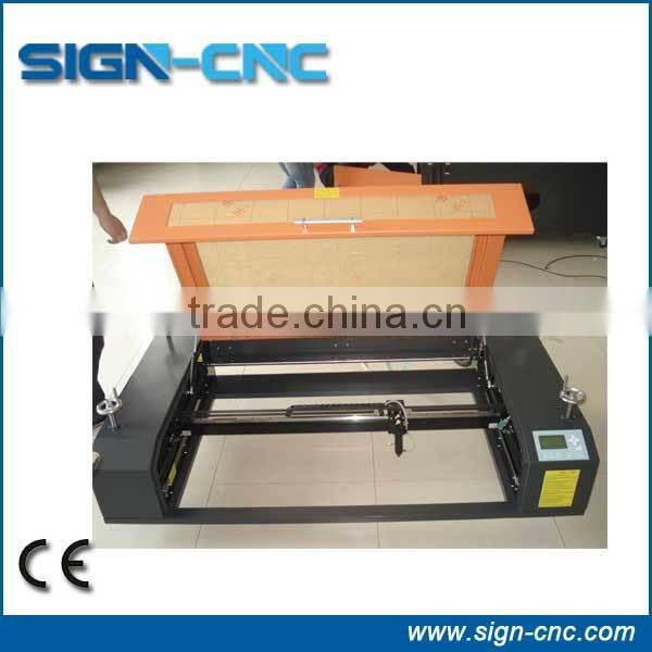 Alibaba Trade Assurance Low cost stone laser engraving machine / co2 stone laser engraver