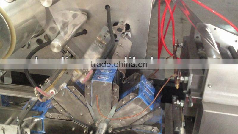 Automatic cellophane overwrapping machine