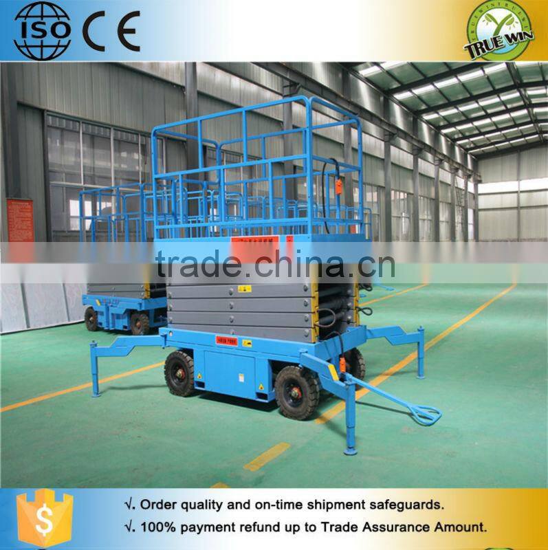 Low price scissor design platform trailing electric mobile scissor lift
