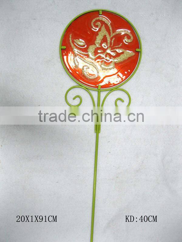 Butterply garden stake glowing in the dark