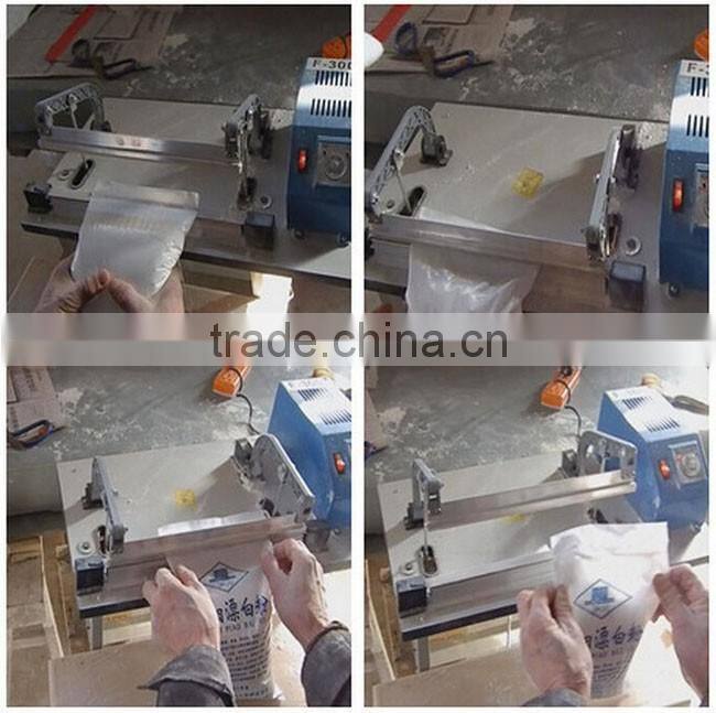 Heat cutting capper and sealing machine for plastic bags