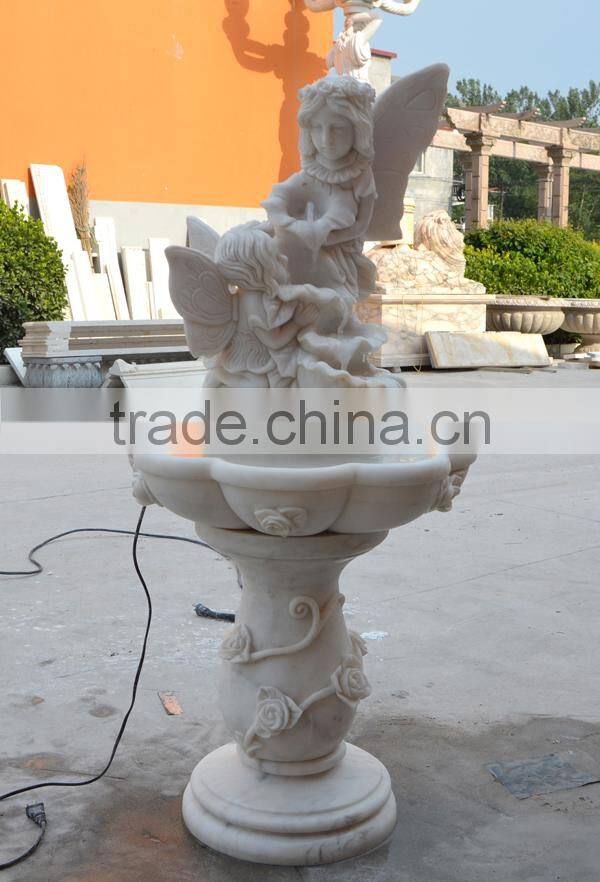 White marble angel fountains